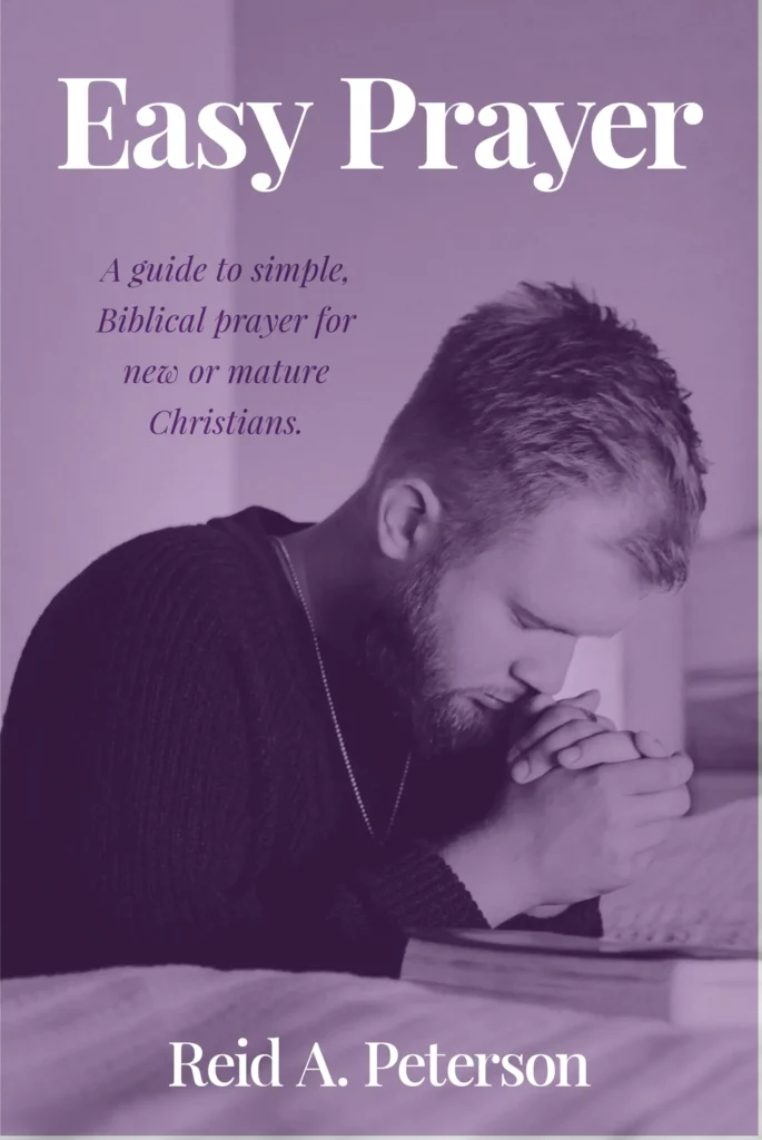 Book cover titled "Easy Prayer" with subtitle "A guide to simple, Biblical prayer for new or mature Christians." by Reid A. Peterson. The image, set in a purple hue, shows a man in a sweater praying with hands clasped over an open Bible.